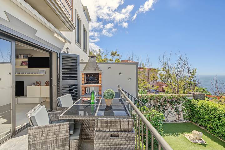 Casa vacacional 'La Casita Gris' con vistas al mar, piscina compartida y Wi-Fi in San Nicolás, El Sauzal