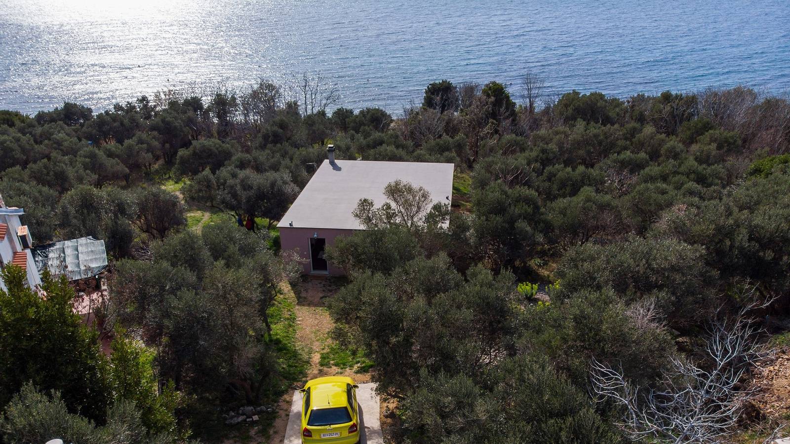 Ferienhaus Oceanne 30m vom Strand mit Meerblick und Garten in Martinscica, Cres