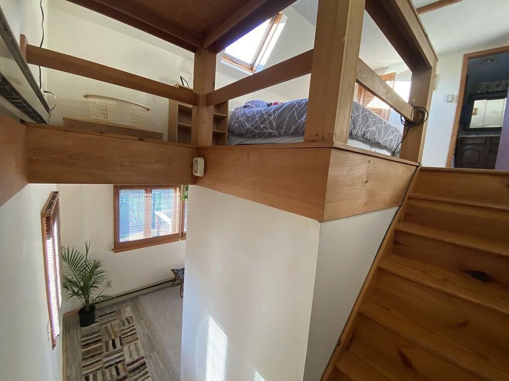 Home with a spring-fed pond and mountain view. in Green Mountain National Forest