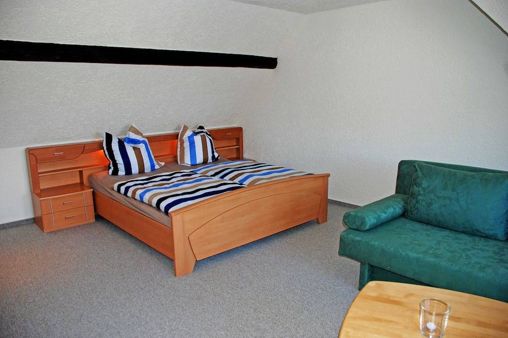 Vacation apartment Pommernhof on the upper floor with sitting area in the garden - Ferienwohnungen auf dem in Samtens, Ruegen