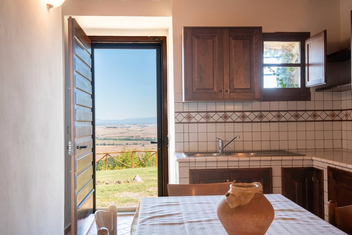 Geheel appartement, Appartement 'Giardino Su Siena' met uitzicht op de heuvels, gedeelde tuin en Wi-Fi in Monteroni d'Arbia, Provincie Siena