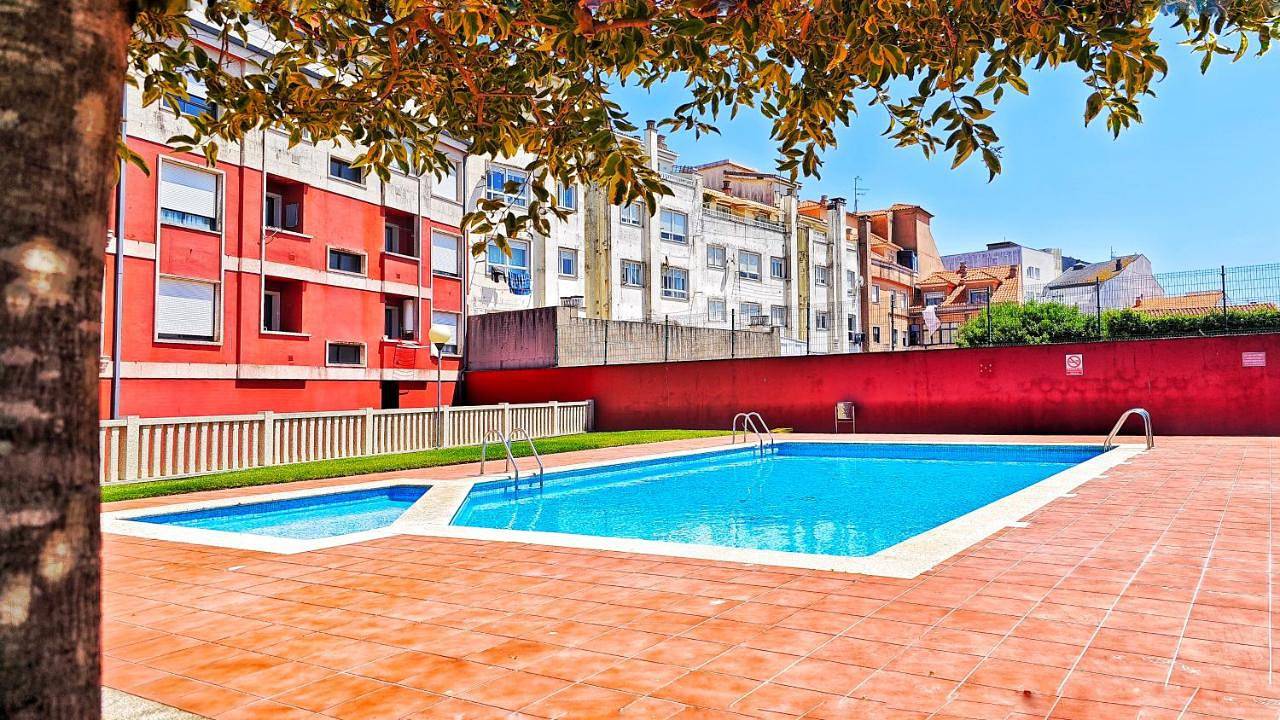 Apartamento entero, Desconectaengalicia La Perla, piscina y parking in Portonovo, Sanxenxo