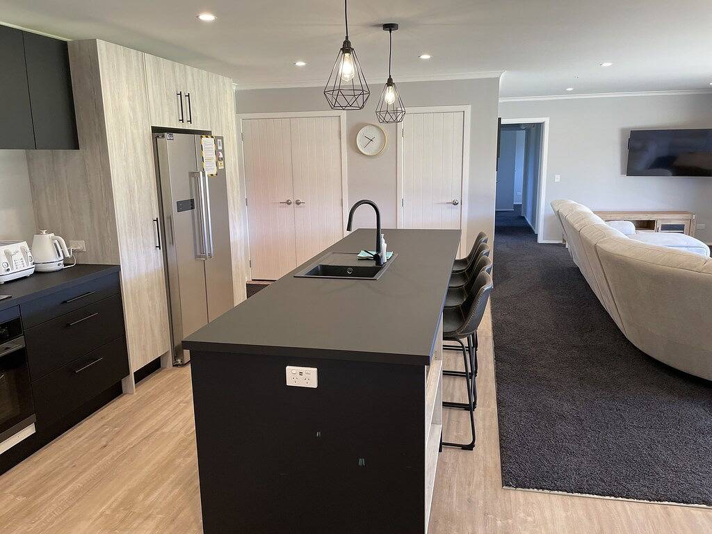 Solar on Snowmass Drive 30c Orange Door in Ohakune, Ruapehu District