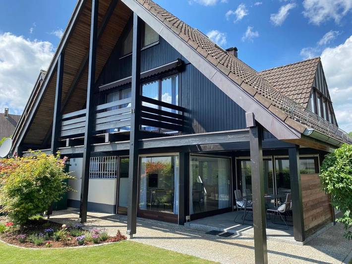 Ferienhaus für 7 Personen, mit Balkon und Terrasse sowie Garten