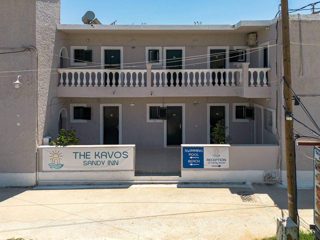 Bed and Breakfast 'The Kavos Sandy Inn-Double Room' with Shared Pool, Wi-Fi and Air Conditioning in Kavos, Corfu