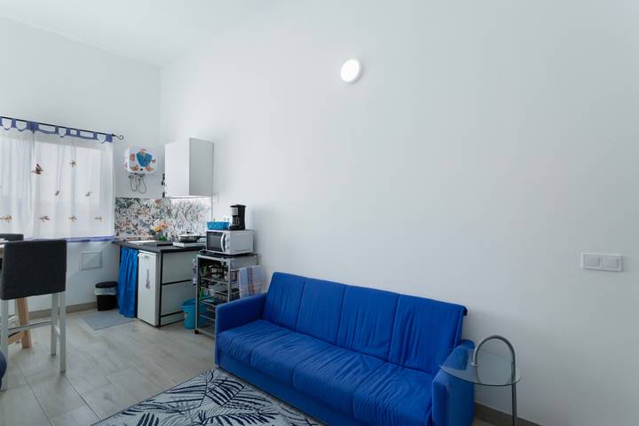 Apartamento entero, Apartamento de vacaciones 'Villa Monica' con vistas al mar, terraza privada y Wi-Fi in Agüimes, Gran Canaria Este