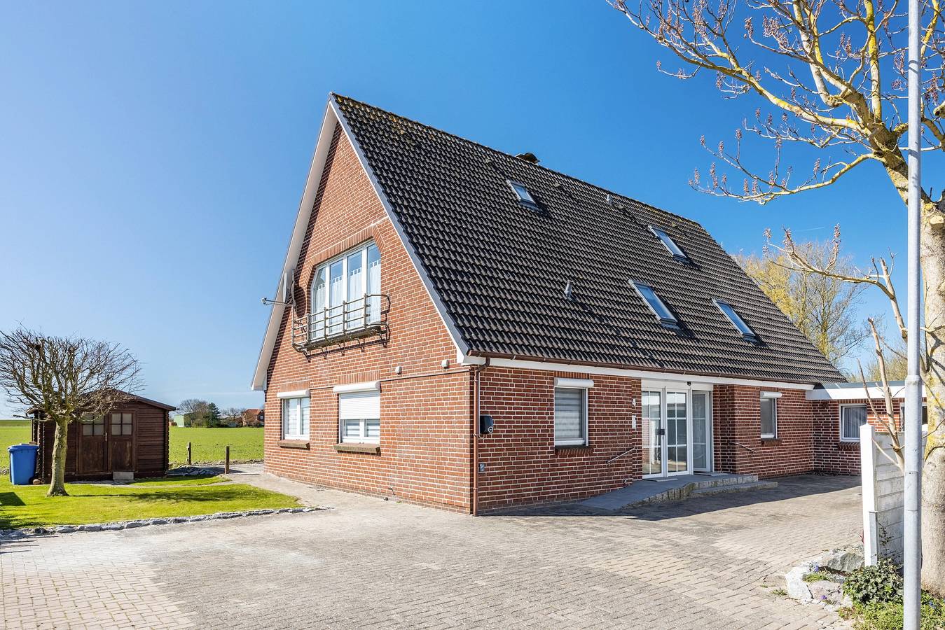 Ganze Wohnung, Ferienwohnung 'Severin' mit Gemeinschaftsterrasse, Gemeinschaftsgarten und Wi-Fi in Kaiser-Wilhelm-Koog, Nordseeküste