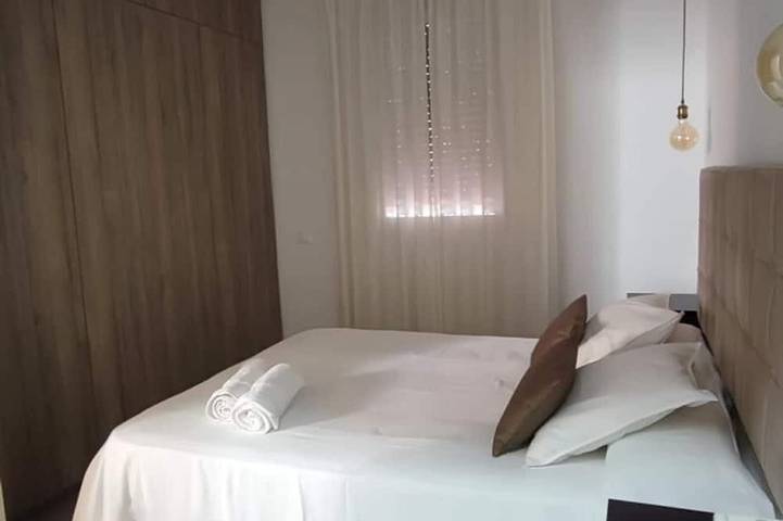 Entire apartment, Charming Andalusian house near beach with private patio in Málaga (Este), Malaga