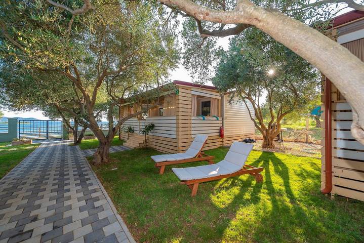 Ferienhaus für 5 Personen, mit Garten in Pakostane