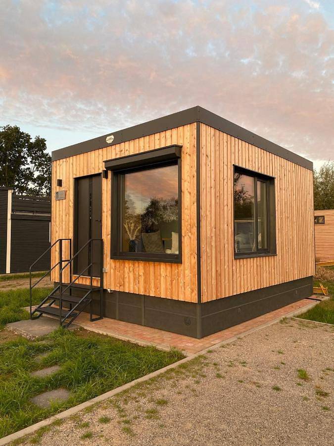 Ferienhaus für 3 Personen, mit Terrasse und Garten sowie Pool und Sauna