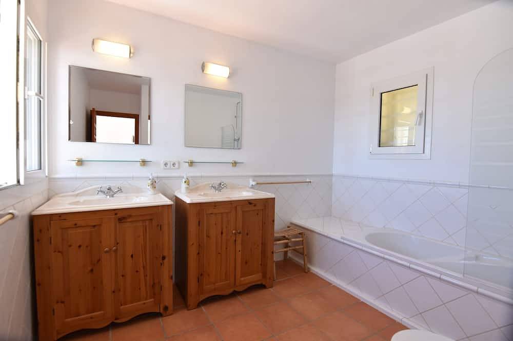 Stunning villa with sea & sunset views, in walking distance to Cala Salada beach in Cala Saladeta, Sant Antoni de Portmany