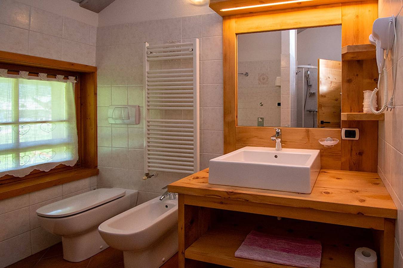 Appartement entier, Appartement 'Chalet Galli Trilocale' avec vue montagne, jardin commun et Wi-Fi in Livigno (Town), Livigno