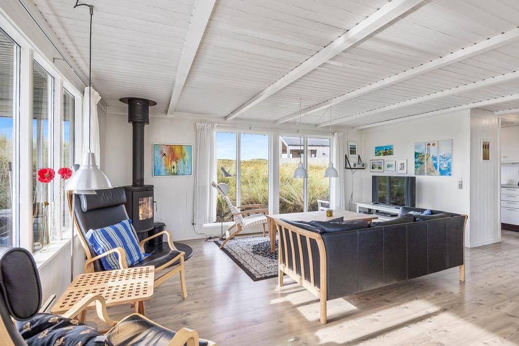 Ferienhaus mitten in den Dünen mit Panoramaaussicht in Bjerregård, Holmsland Klit