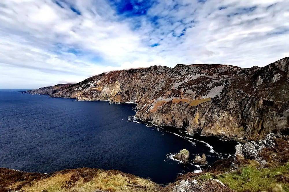 Teach Condy's Cottage nestled at the bottom of Sliabh Liag Cliffs, Co. Donegal in Donegal, County Donegal