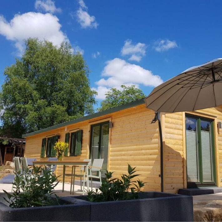Ferienhaus für 4 Personen, mit Terrasse und Garten sowie Sauna in Mücke