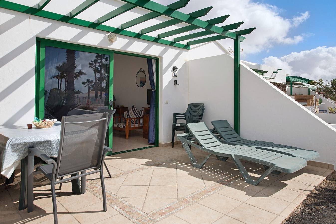 Appartamento intero, Appartamento "Jardin del Sol 22" vicino alla spiaggia con giardino privato e piscina condivisa in Playa Blanca, Yaiza