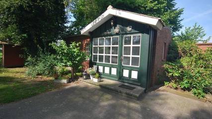 Ferienhaus für 2 Personen, mit Garten und Terrasse in Uplengen