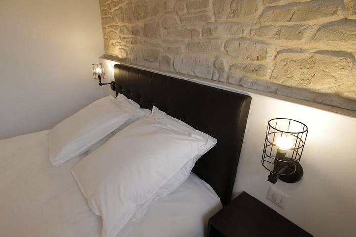 Appartement de vacances pour 4 personnes, avec jacuzzi ainsi que jardin et terrasse