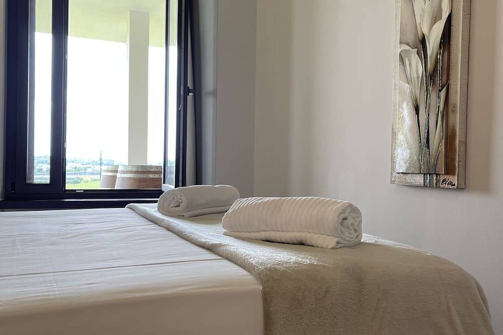 Apartamento entero, Apartamento 'Appartamento Mael' con jardín compartido, Wi-Fi y aire acondicionado in Valeggio sul Mincio, Provincia de Verona