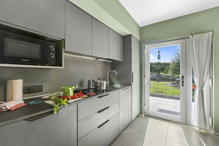 Appartamento intero, Villa Al Fiume - Oasi Verde in Torbole sul Garda in Nago-Torbole, Prealpi Gardesane