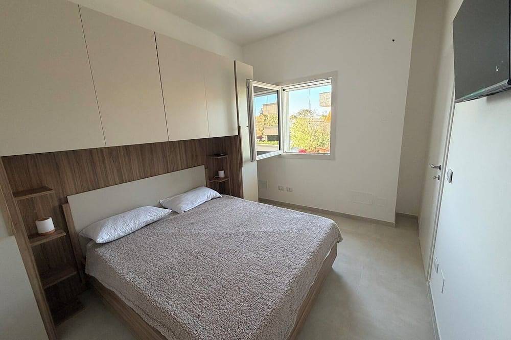 Appartement entier, Newly built vacation home sleeps 4 a few steps from the sea in Marina di Pulsano, Pulsano