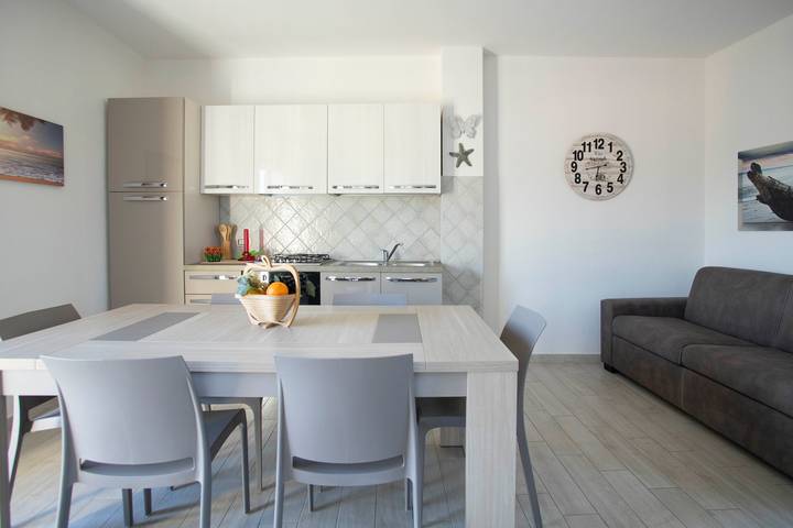 Hel lejlighed, Apartment 'You and Me Apartment' with Sea View, Private Terrace and Air Conditioning in Isola Rossa, Trinità d'Agultu e Vignola Området