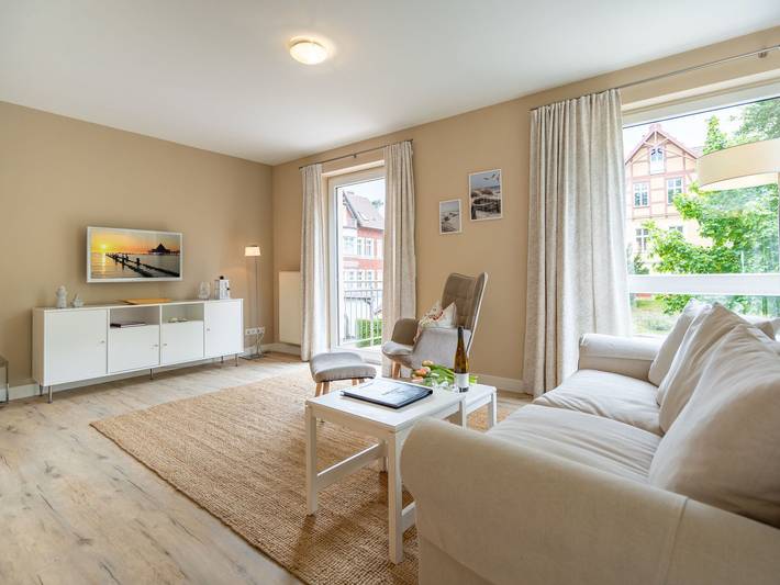 Ferienwohnung für 4 Personen, mit Balkon und Garten sowie Sauna