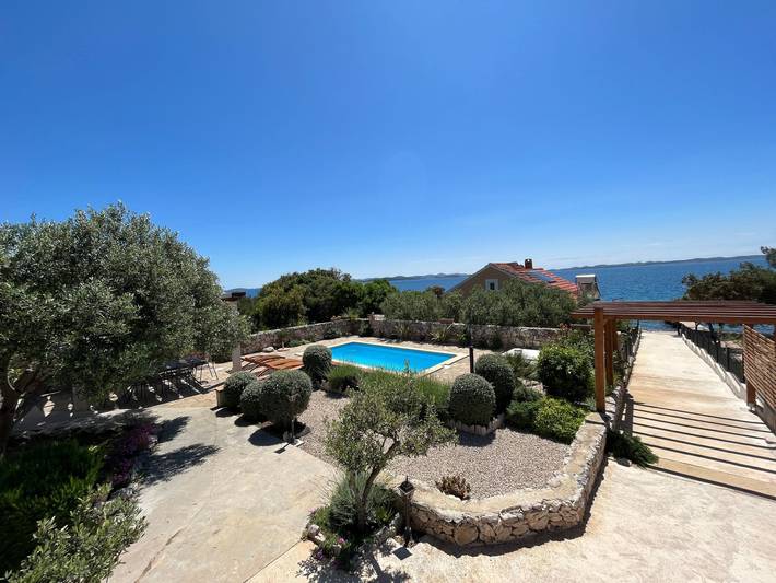 Ferienhaus für 4 Personen, mit Terrasse und Garten sowie Pool