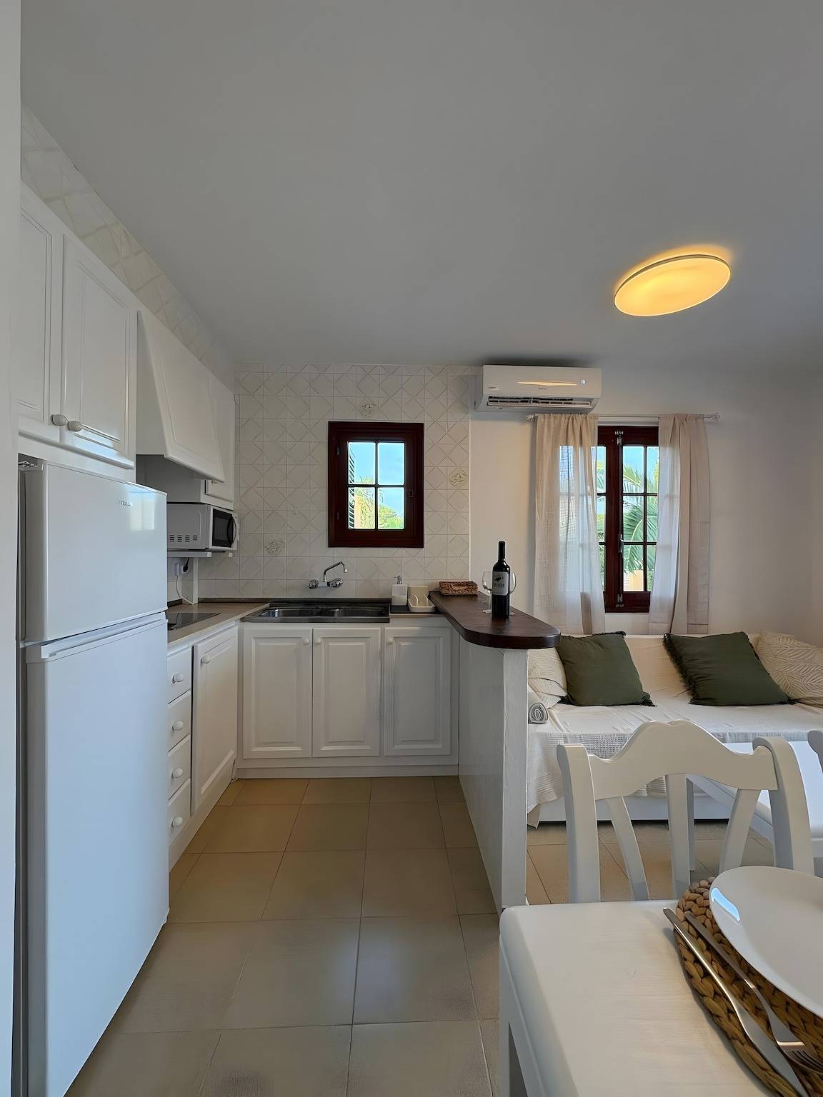 Apartment 'On the Beach with Pool' with Shared Pool, Wi-Fi, and Air Conditioning in Son Xoriguer, Ciutadella
