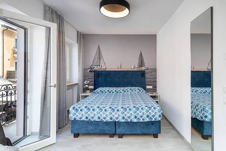 Appartamento intero, Regarda - Baur Suite 1, design nel centro di Bardolino in Spiaggia Punta Cornicello (Bardolino), Bardolino
