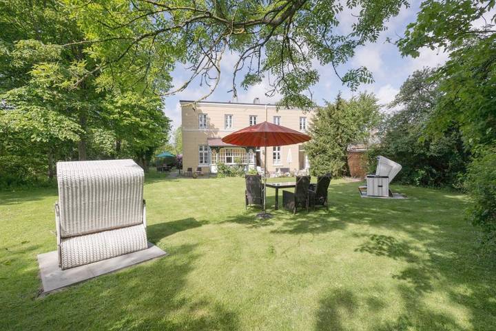 Ferienwohnung mit Meerblick für 3 Personen, mit Terrasse und Garten sowie Ausblick