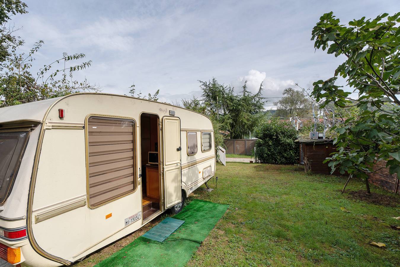 Appartamento intero, Appartamento 'Spiaggia Pascolo - 300 mq di giardino' con vista lago, piscina privata e Wi-Fi in Gozzano, Lago d'Orta