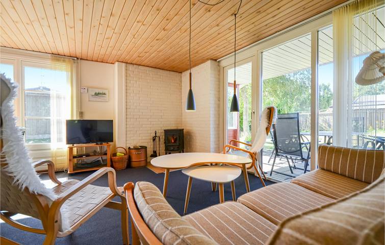 Ferienhaus für 4 Personen mit Terrasse in Grenå Strand, Grenaa