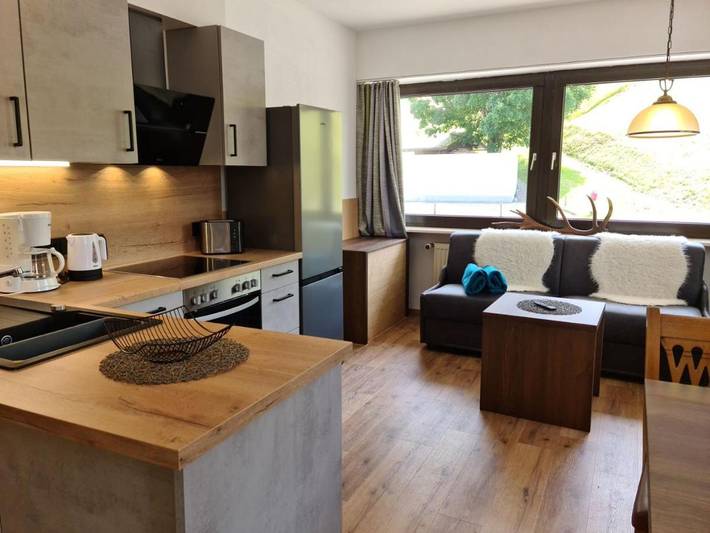 Ferienwohnung für 7 Personen, mit Balkon und Terrasse sowie Ausblick in Riezlern