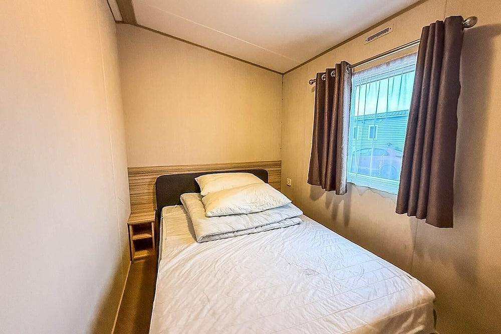 6 berth caravan with side decking at Suffolk Sands Holiday Park in Felixstowe, Suffolk