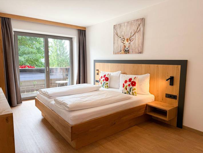 Hotel für 4 Personen, mit Seeblick und Balkon, kinderfreundlich in Maishofen