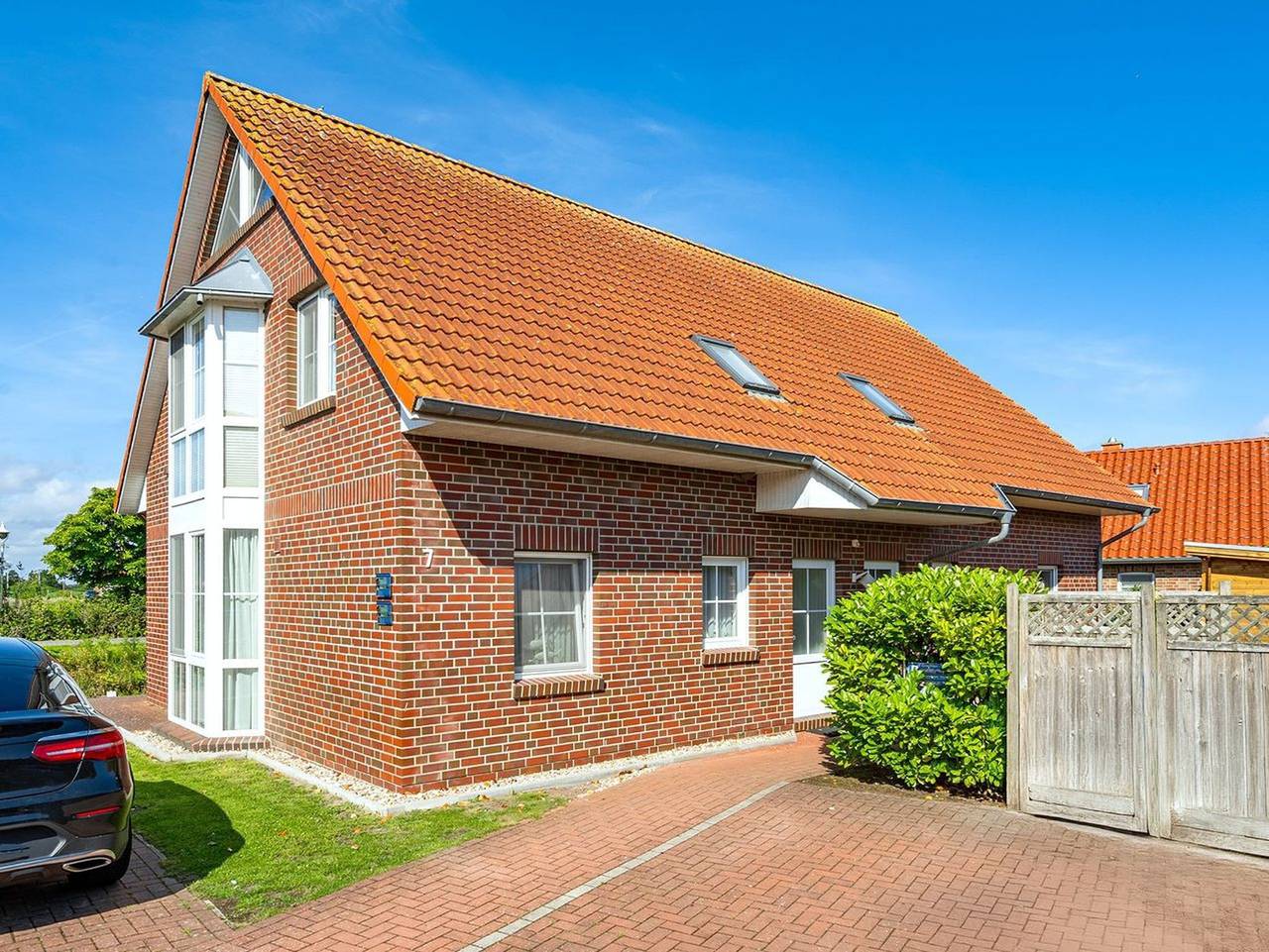 Ganze Ferienwohnung, Grachtenstube - Ferienwohnung direkt am Wasser in Greetsiel, Krummhörn