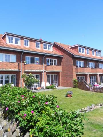 Ferienwohnung für 4 Personen, mit Garten und Terrasse sowie Seeblick, mit Haustier in Wittdün
