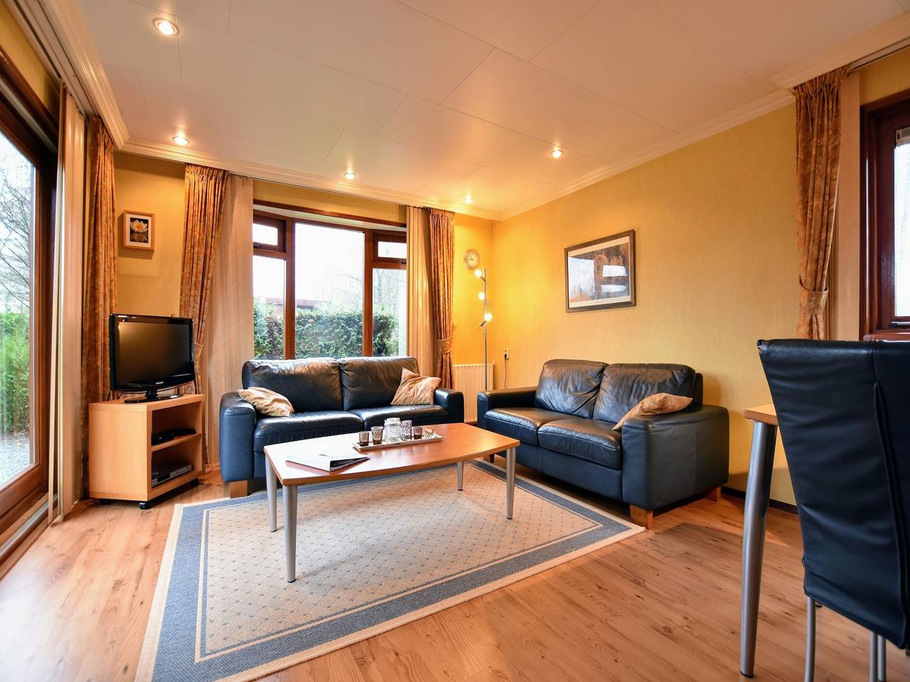 Spacious Chalet in Garderen with Fenced Garden in Veluwe