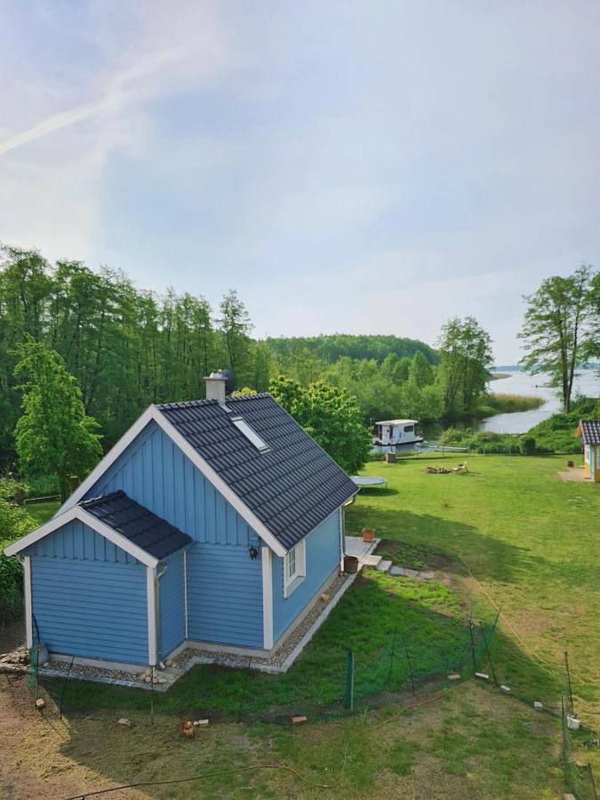 Ferienhaus für 4 Personen, mit Terrasse und Seeblick sowie Ausblick in Fehrbellin