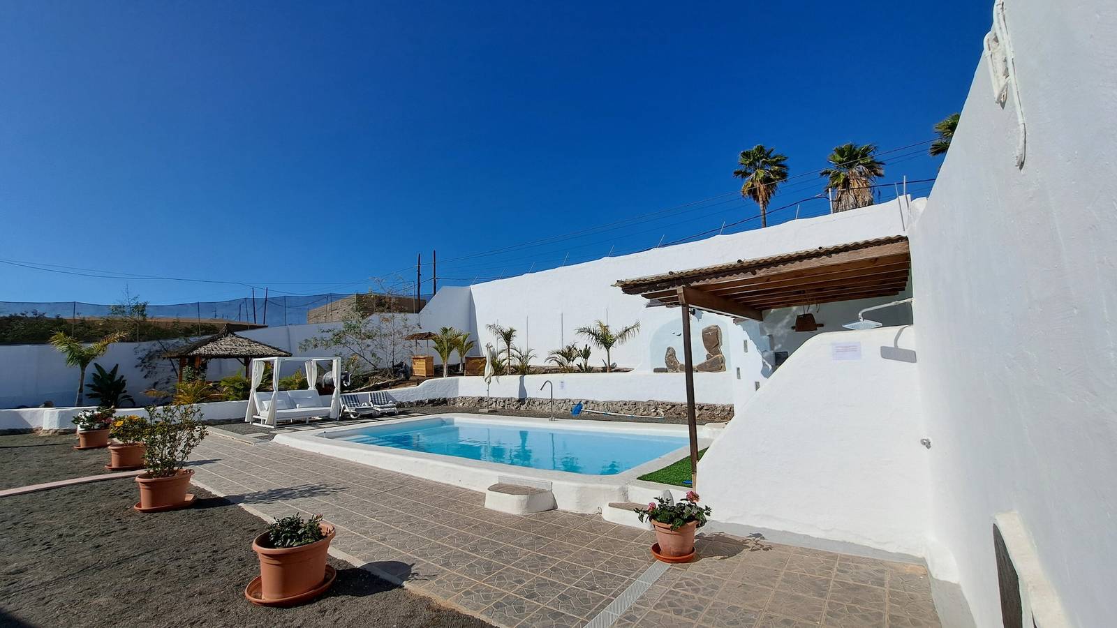Geheel appartement, Appartement 'Esquina' met zeezicht, gemeenschappelijk zwembad en wifi in San Bartolomé de Tirajana, Zuid Gran Canaria