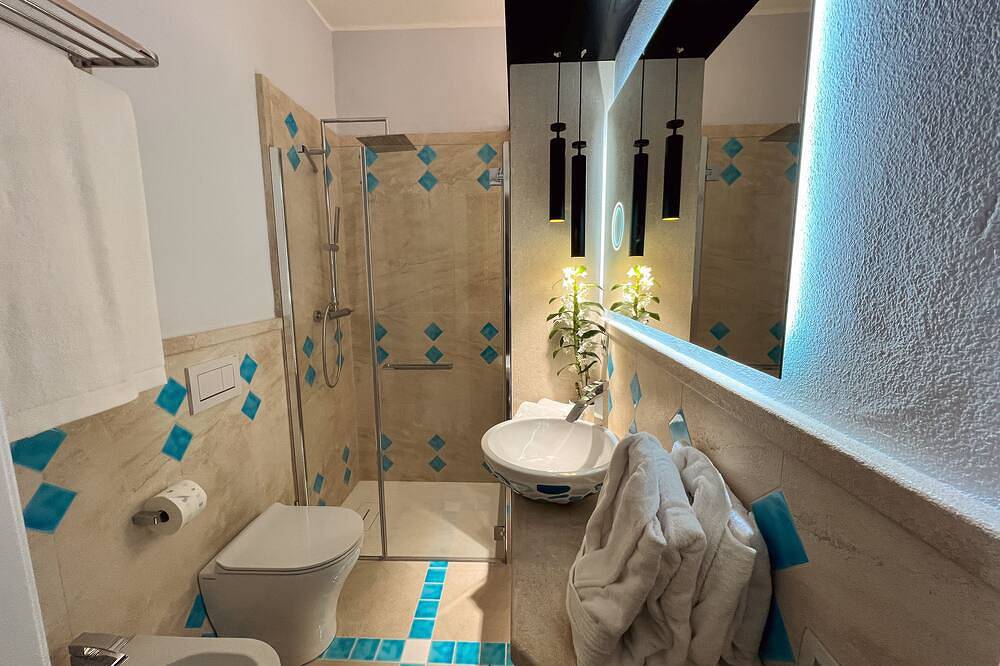 Apartamento entero, Villa Aquamarina Red Pavoncella in Playa de Porto Pino, Porto Pino