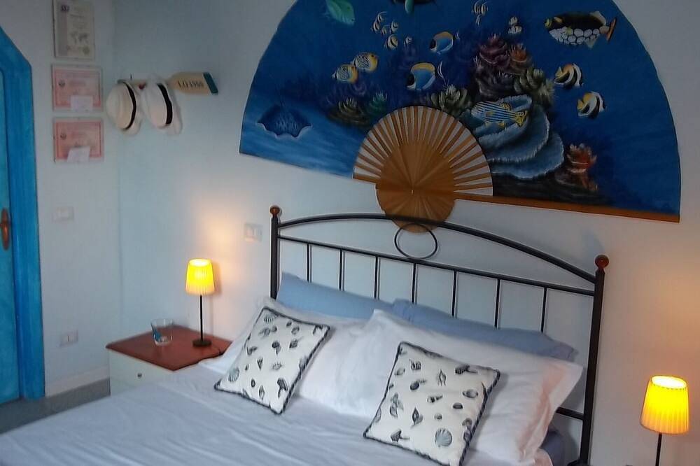 Appartamento intero, Appartamento con 2 camere, giardino privato,acceso privato al mare e piscina in Cala Piccola, Maremma