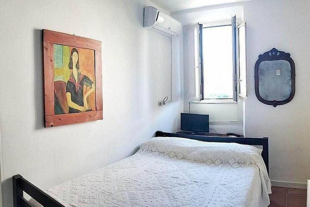 Appartement entier, Casa Velunia: A welcoming two-story apartment situated in a central location, at a short distance from the shores of Lake Bracciano, with Free Wi-Fi. in Bracciano, Lac de Bracciano