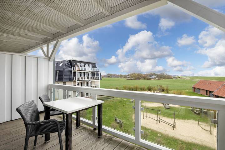 Ferienwohnung für 2 Personen, mit Sauna und Balkon sowie Ausblick in Wremen