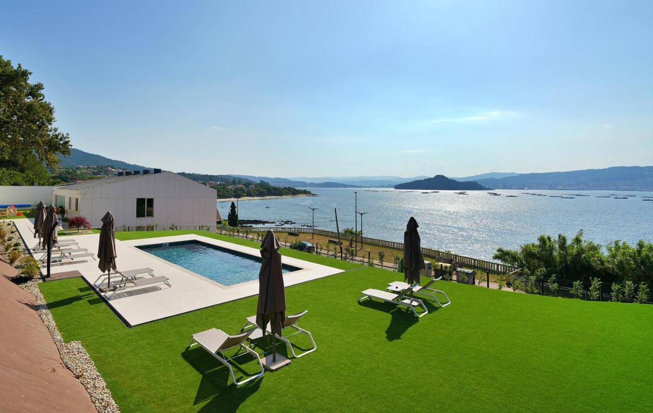 Galihost - Rd Hotel Apartamento con piscina climatizada in Praia de Laño (Poio), Poyo