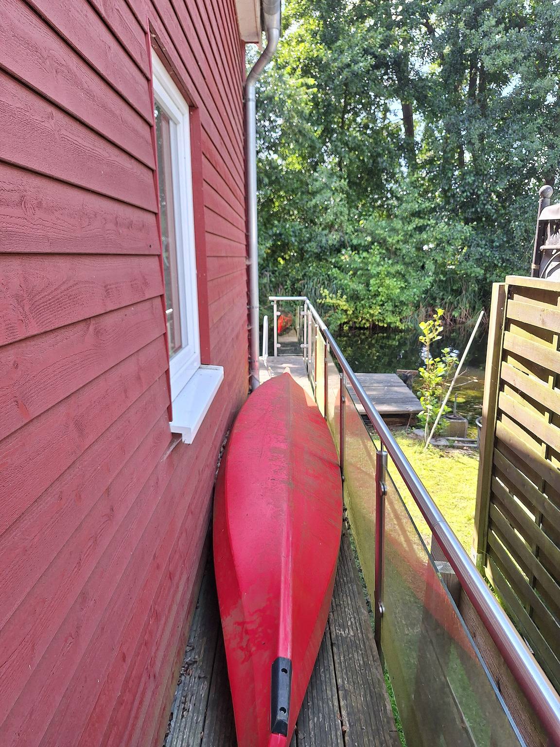 Ferienhaus 'Am Wasser, Bootshaus' mit privater Terrasse in Güstrow, Mecklenburgische Seenplatte