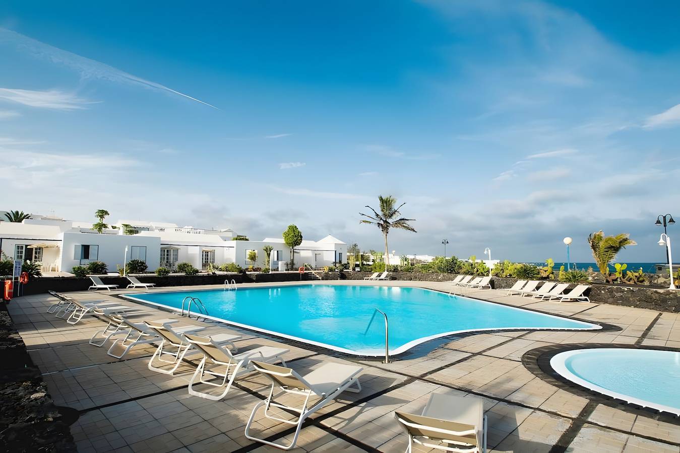 Ferienhaus 'Caleta Campos Bungalows' mit Meerblick, Gemeinschaftspool und Wlan in Punta de las Mujeres, Haría