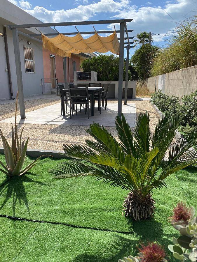 Appartamento per 8 persone, con Terrazza e Giardino nonché Panorama a Punta Braccetto