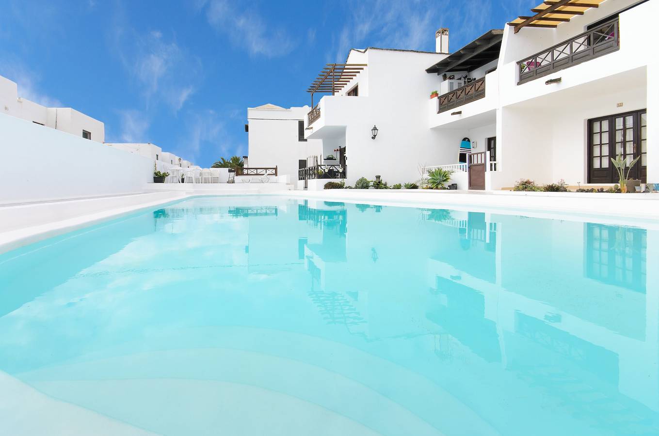 Apartamento entero, Apartamento vacacional 'Los Morales' con piscina compartida, terraza privada y Wi-Fi in Puerto del Carmen, Tías